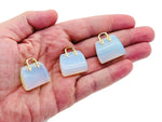 Opalite crystal handbag pendant carved from gemstone, featuring a purse design, by GemstoneGO.