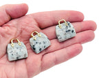 Kiwi Jasper crystal purse carving gemstone pendant featuring a detailed handbag design, handcrafted by GemstoneGO.