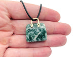 Green Jade Crystal purse carving gemstone pendant featuring a detailed Qinghai Jade handbag design, handcrafted by GemstoneGO.