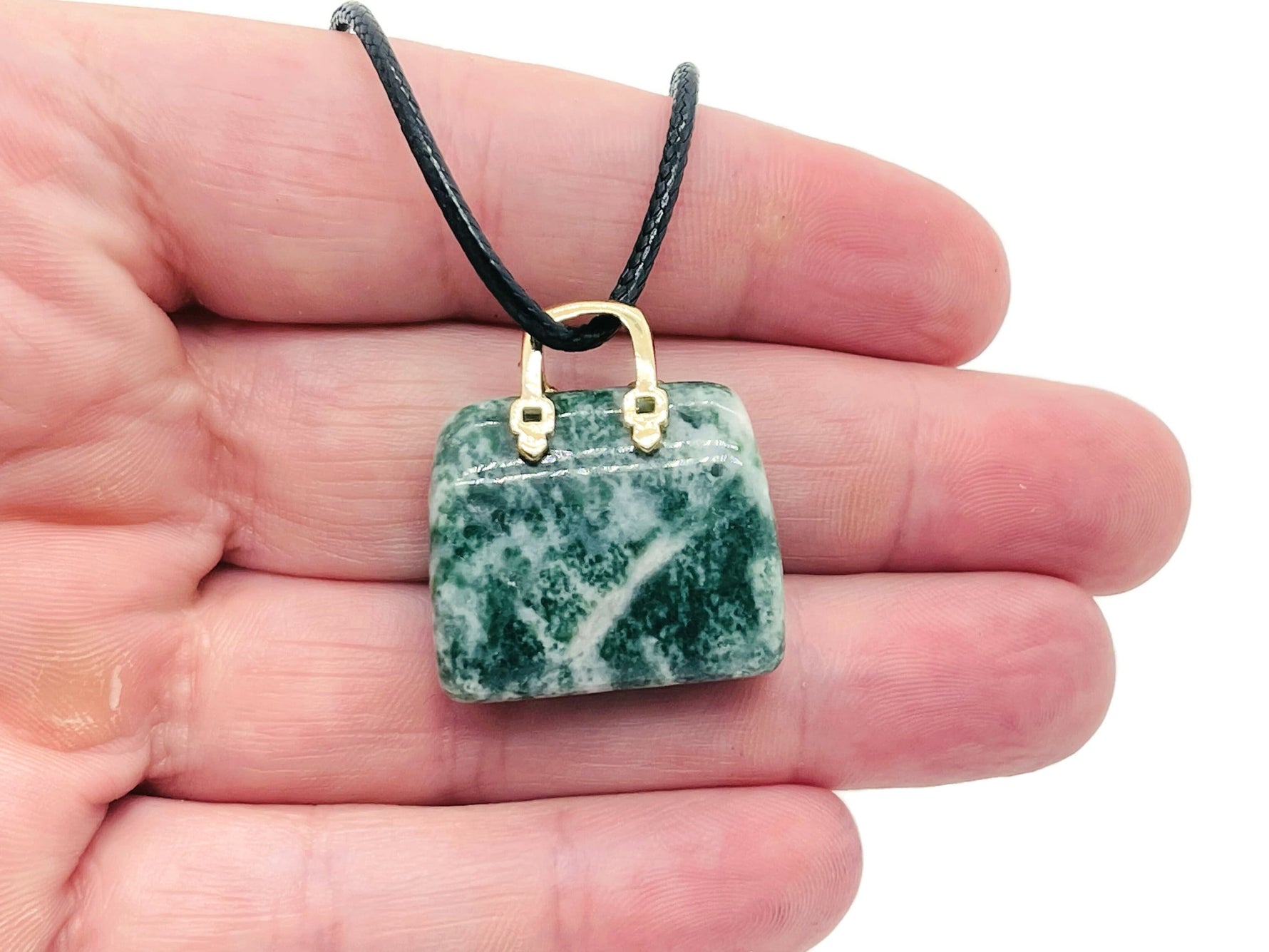 Green Jade Crystal purse carving gemstone pendant featuring a detailed Qinghai Jade handbag design, handcrafted by GemstoneGO.