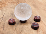 Mahogany Obsidian crystal sphere on carved gemstone stand, decorative home decor piece by GemstoneGO.