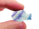 Colorful fluorite aquarium fish carving gemstone with intricate details, showcasing vibrant hues and craftsmanship by GemstoneGO.