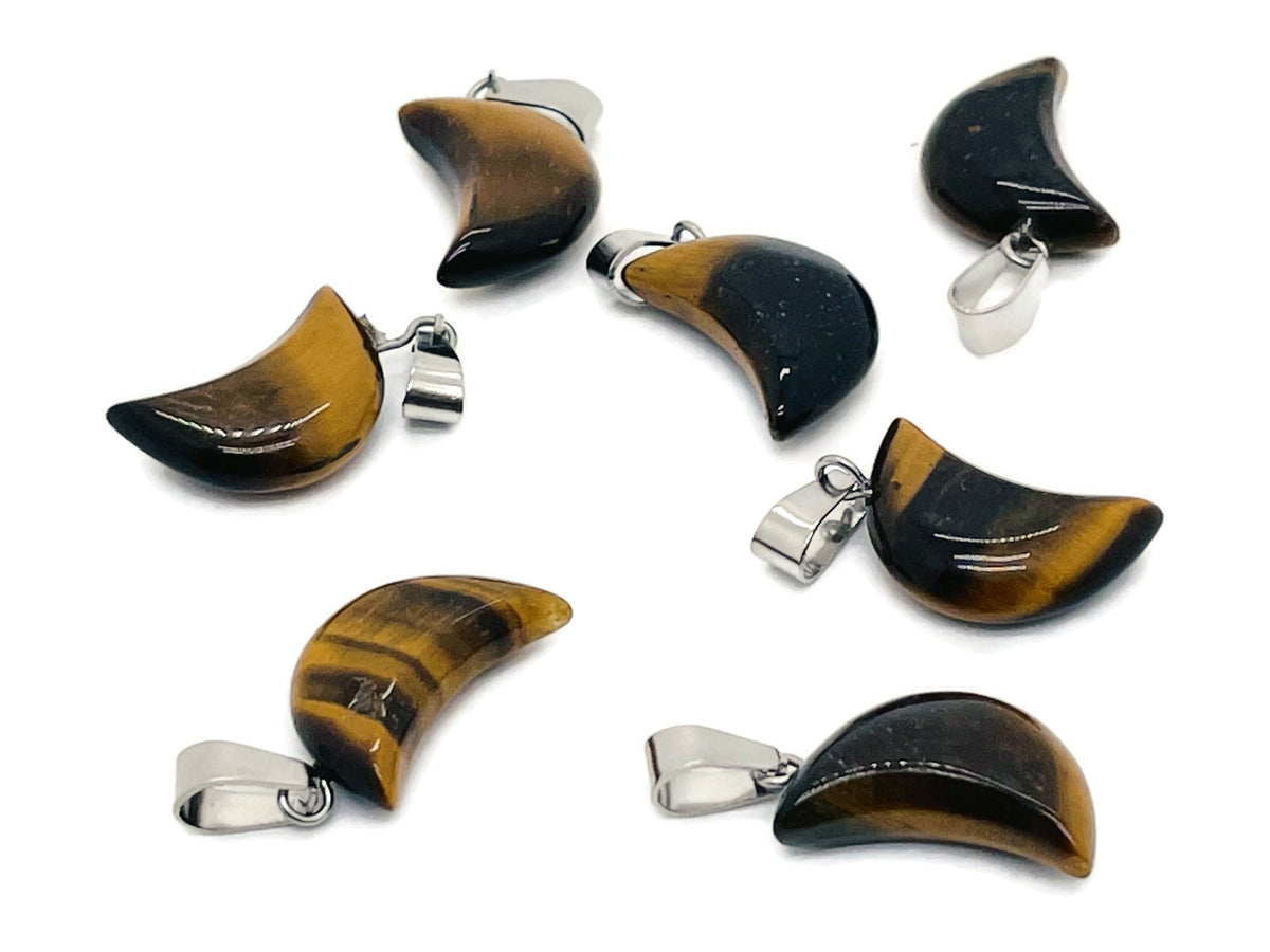Tiger Eye moon crystal pendant from GemstoneGO, showcasing a polished gemstone with a moon shape suitable for jewelry making.