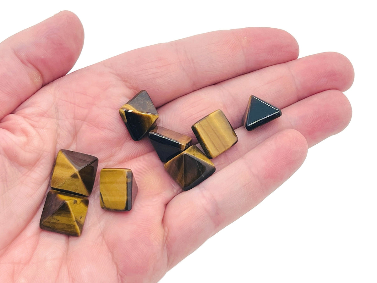 14mm Tiger Eye pyramid gemstone carving by GemstoneGO, showing the polished, golden-brown stone with natural striations.