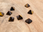 14mm Tiger Eye pyramid gemstone carving from GemstoneGO, showcasing the polished, golden-brown pyramid shape with natural stone pattern.