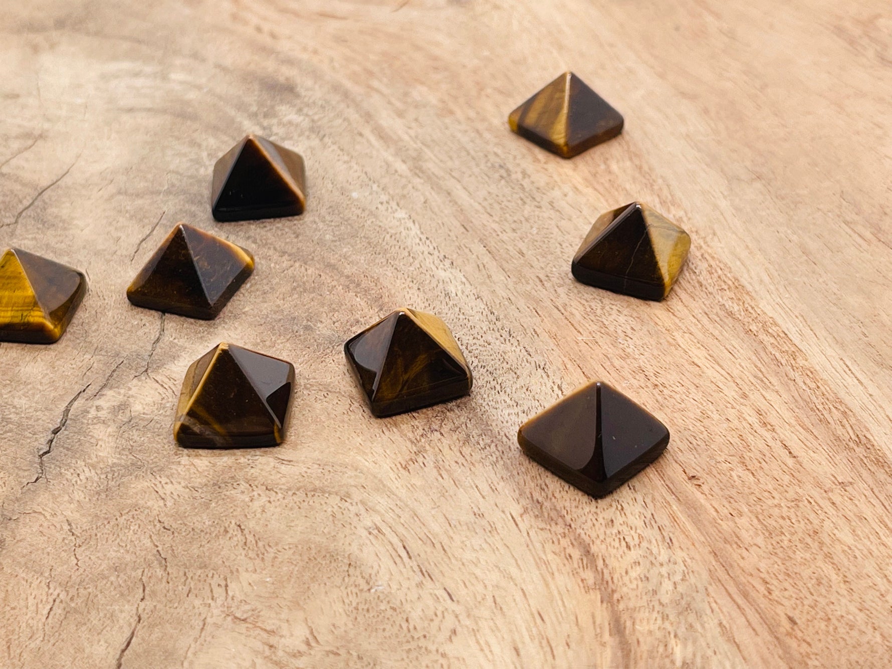 14mm Tiger Eye pyramid gemstone carving from GemstoneGO, showcasing the polished, golden-brown pyramid shape with natural stone pattern.