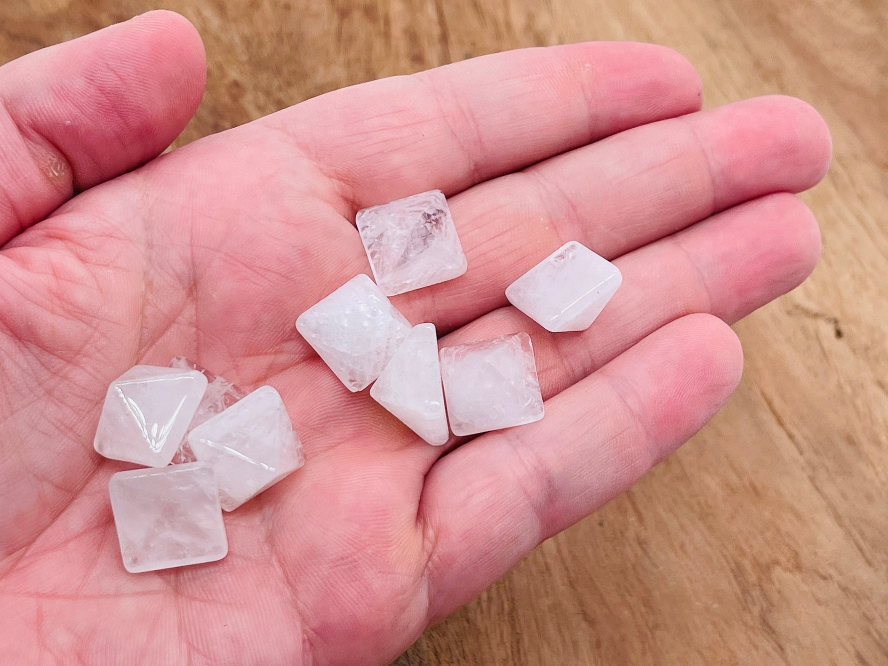 14mm clear quartz pyramid gemstone carving from GemstoneGO, showcasing a polished, translucent crystal pyramid.