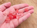 14mm Cherry Quartz pyramid gemstone carving from GemstoneGO, showcasing a vibrant red crystal with smooth facets.