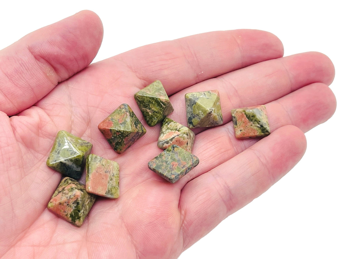 Unakite pyramid carving gemstone from GemstoneGO, 14mm, showing its green and pink mineral patterns and smooth pyramid shape.
