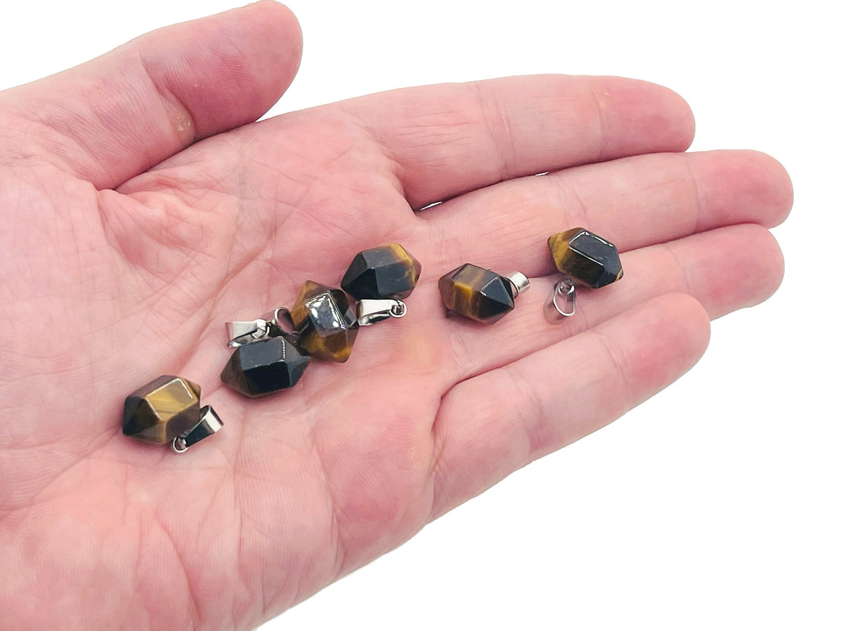 Tiger Eye Point crystal pendant from GemstoneGO, showcasing a polished, pointed gemstone ideal for jewelry making and craft projects.