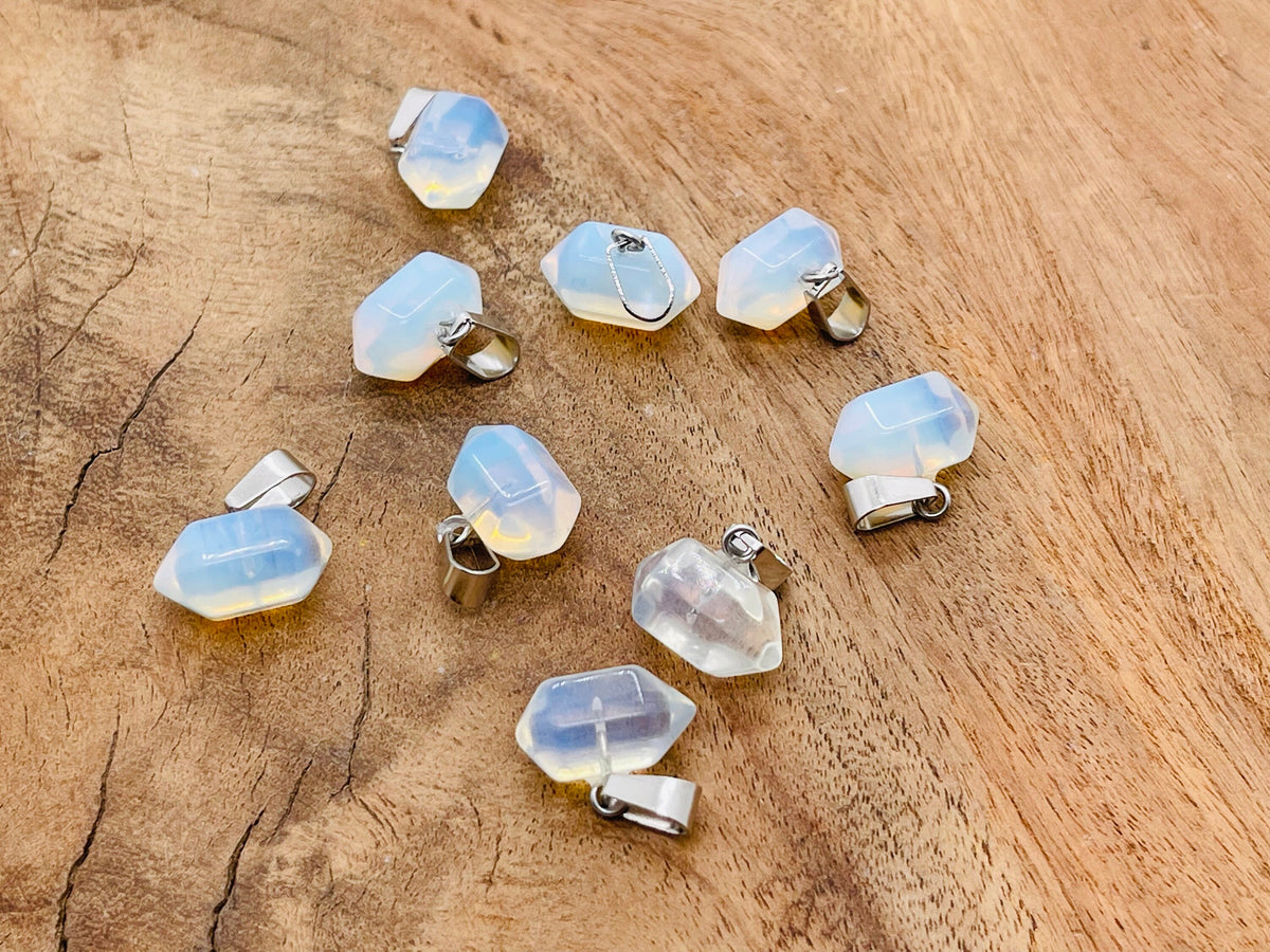 Opalite point crystal pendant from GemstoneGO, ideal for jewelry making, showcasing a smooth, luminous opalite gemstone.