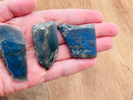 Labradorite flat gemstone slab from GemstoneGO with iridescent surface and natural stone pattern for jewelry or crafts.