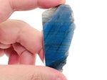 Labradorite flat gemstone slab with iridescent blue and green flashes, showcasing polished crystal surface from GemstoneGO.