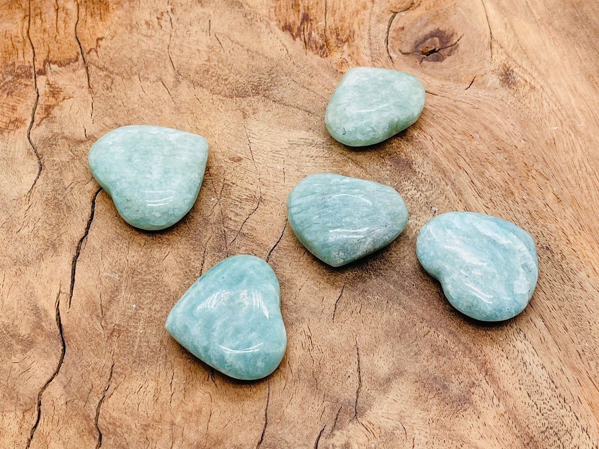 Polished Amazonite heart-shaped gemstone from GemstoneGO, showcasing vibrant blue-green color and smooth, rounded surface.