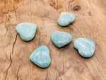 Polished Amazonite heart-shaped gemstone from GemstoneGO, showcasing vibrant blue-green color and smooth, rounded surface.