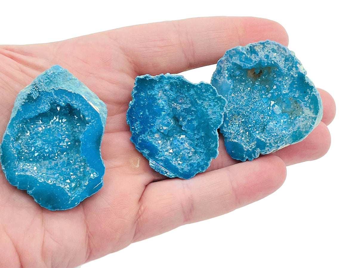 Blue Aura Oco Agate geode raw crystal from GemstoneGO, showcasing vibrant blue hues and natural crystalline structure.