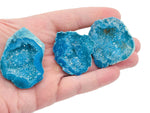 Blue Aura Oco Agate geode raw crystal from GemstoneGO, showcasing vibrant blue hues and natural crystalline structure.