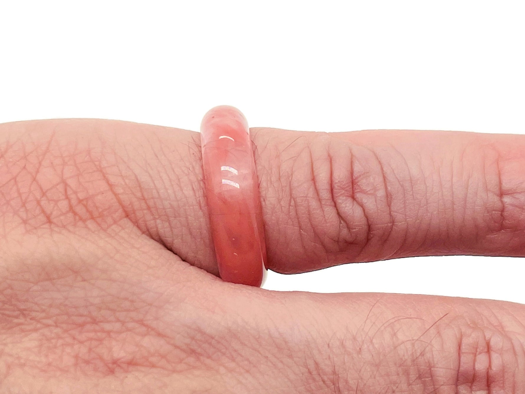 Cherry quartz crystal ring by GemstoneGO featuring a vibrant cherry-red gemstone set in a sleek metal band.