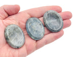 Labradorite worry stone from GemstoneGO, 4.5x3.5cm, featuring iridescent, soothing crystal polished for stress relief and meditation.