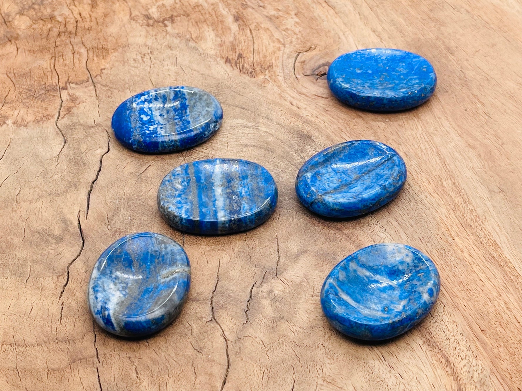 Lapis Lazuli worry stone from GemstoneGO, 4.5x3.5cm soothing crystal with deep blue and gold flecks, smooth polished surface.