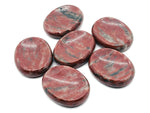 Red Sesame Jasper worry stone from GemstoneGO, smooth 4.5x3.5cm crystal for soothing stress relief and mindfulness.