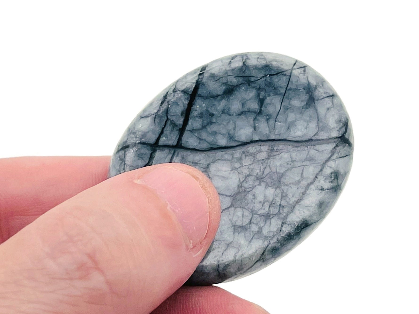 Black Network Jasper worry stone with smooth surface, measuring 4.5x3.5cm, from GemstoneGO, designed for soothing crystal therapy.