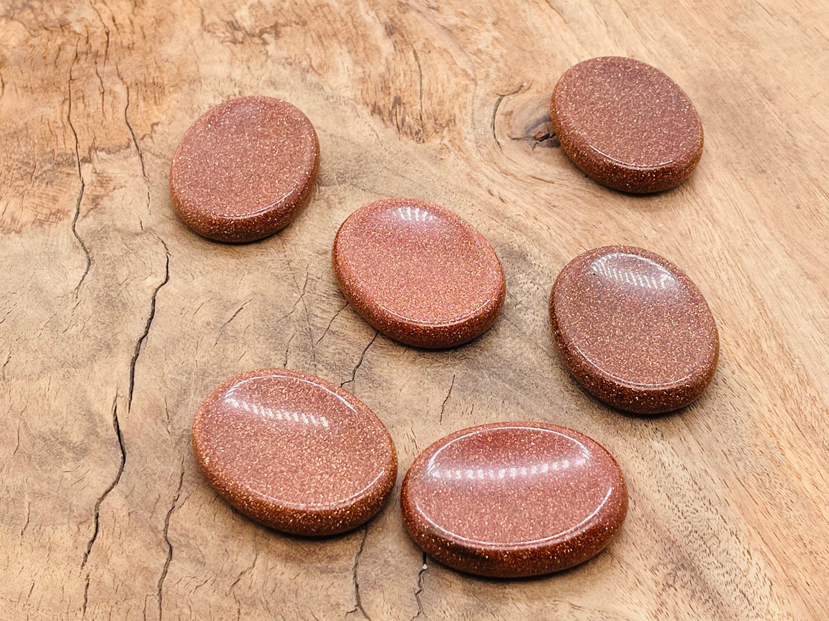 Goldstone worry stone from GemstoneGO, 4.5x3.5cm soothing crystal for stress relief and meditation.
