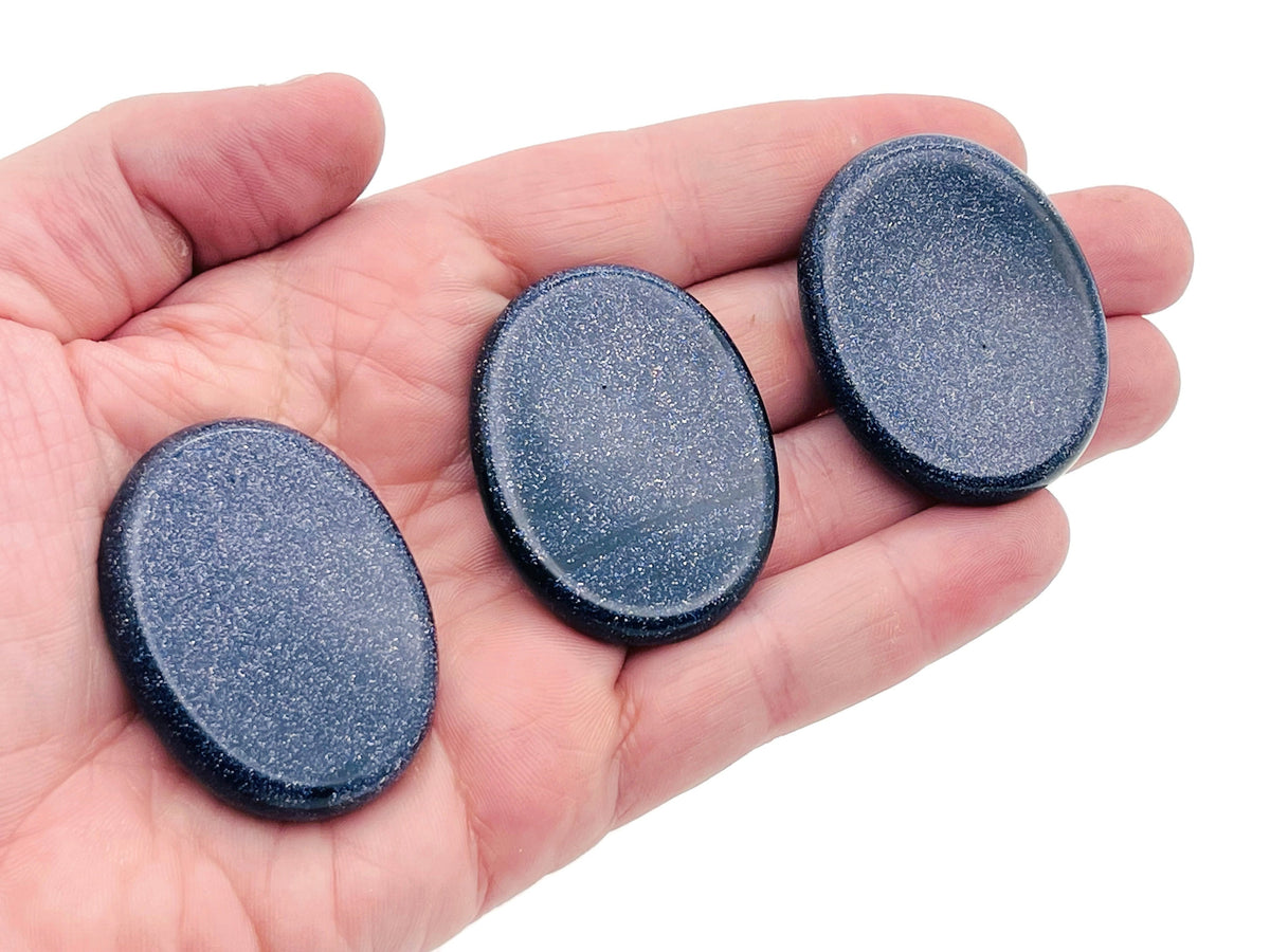 Blue Goldstone worry stone from GemstoneGO, smooth 4.5x3.5cm crystal for soothing stress relief.