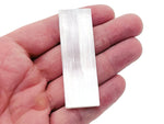 Raw Selenite wand stone from GemstoneGO, 4-12cm, featuring a natural, stick-shaped crystal with a smooth, translucent surface.