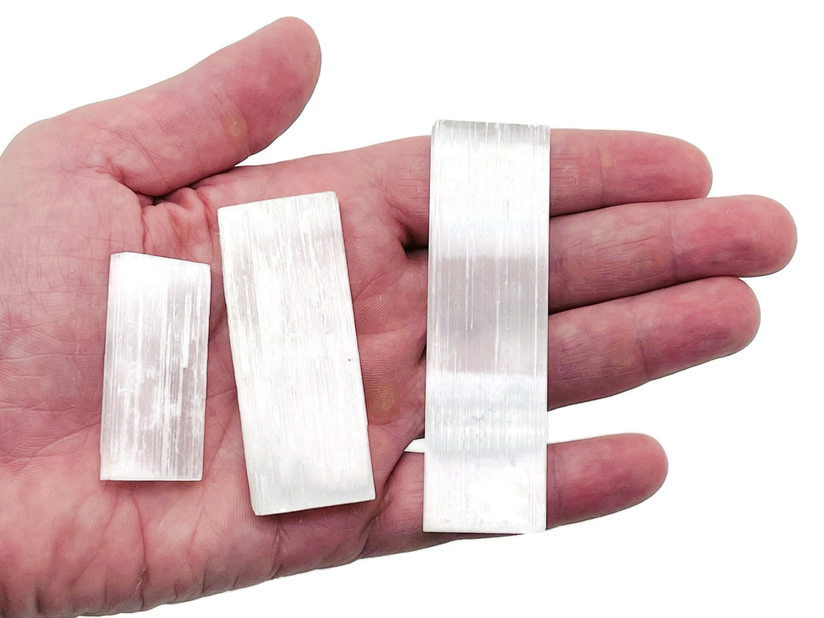 Raw Selenite Wand Stone from GemstoneGO, 4-12cm, natural stick shape in assorted sizes, translucent white mineral for healing and energy.