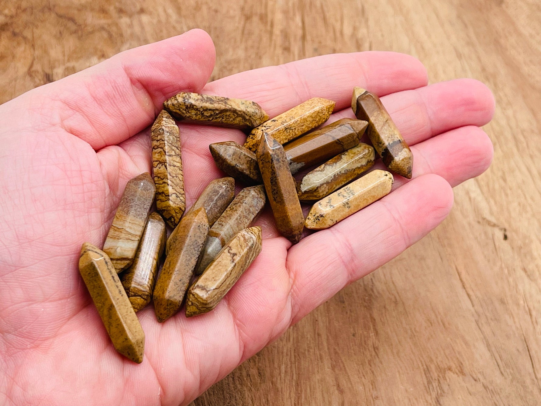 Picture Jasper carved point gemstone from GemstoneGO, 33mm, featuring natural earthy tones and a polished terminated shape.