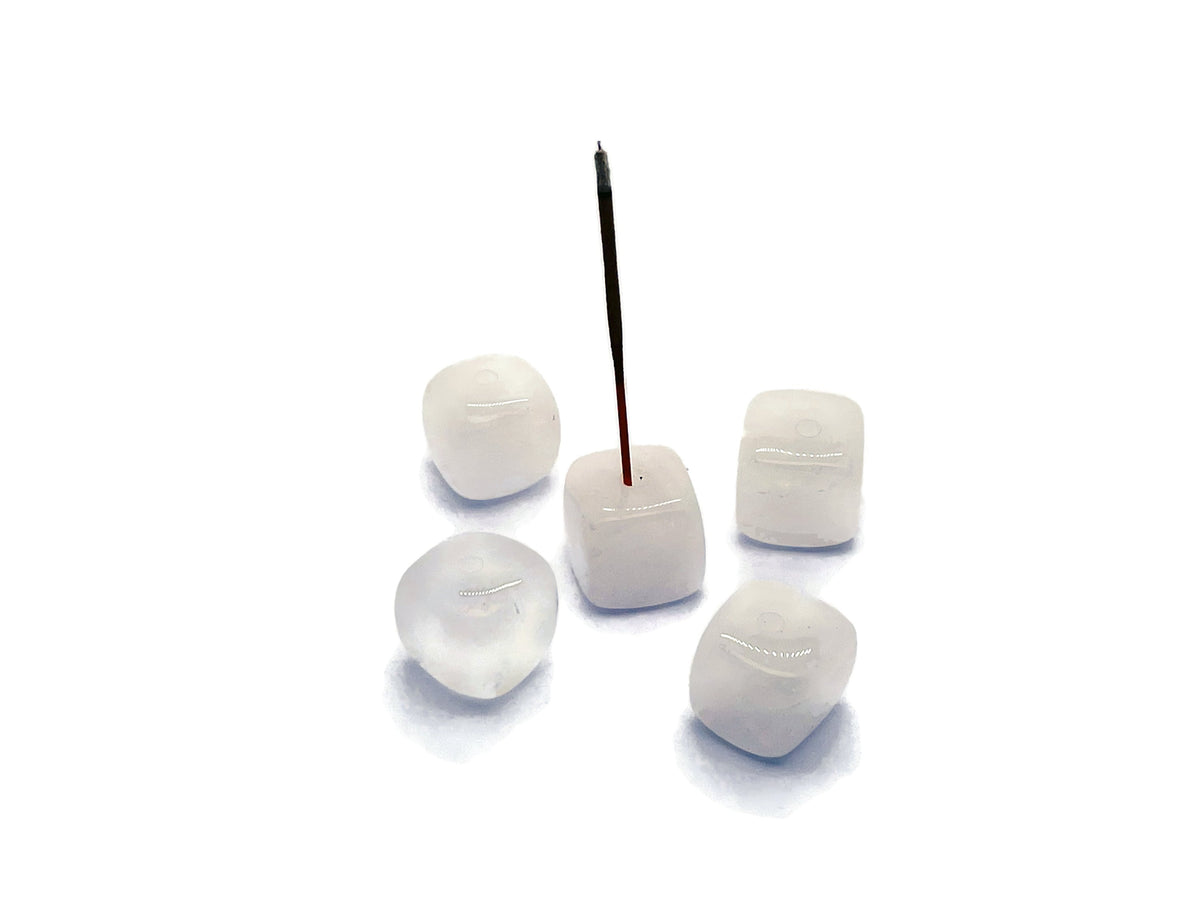 Clear quartz crystal incense holder with carved design, used for holding incense sticks, handmade gemstone decor from GemstoneGO.