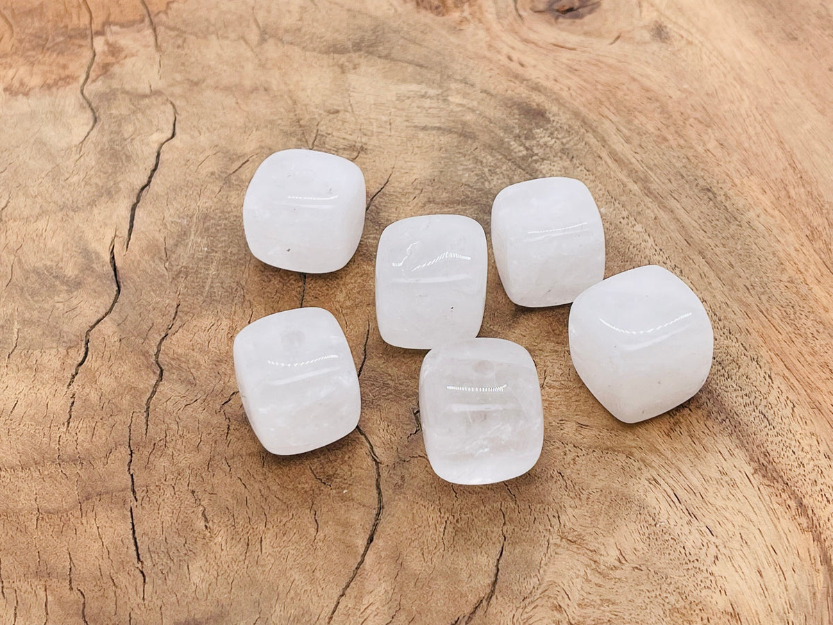 Handmade clear quartz crystal incense holder with carved design, perfect for holding incense sticks and showcasing natural gemstone beauty.