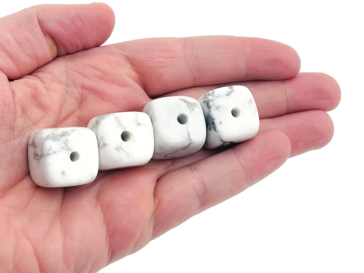 Handmade Howlite crystal incense holder with carved design, perfect for holding incense sticks and enhancing spiritual decor.