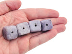 Lepidolite crystal incense holder with carved design, handmade gemstone stone for incense sticks, showcasing natural purple hues.