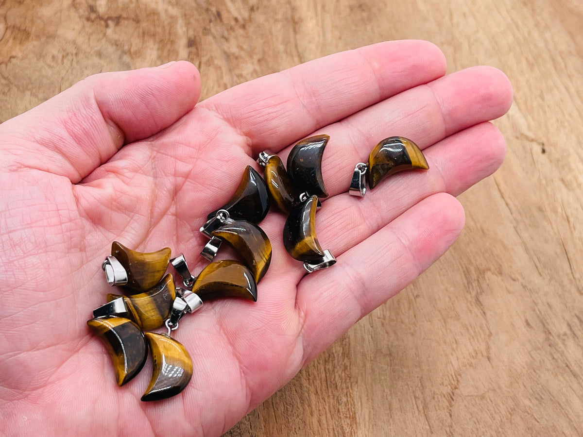 Tiger Eye moon crystal pendant by GemstoneGO, featuring a polished gemstone with a moon shape, ideal for jewelry making.