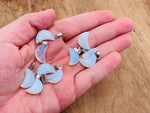 Opalite moon crystal pendant from GemstoneGO showing a smooth, glowing white gemstone with moon-like shape for jewelry making.