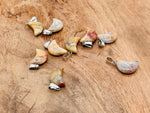 Crazy Lace Agate moon crystal pendant from GemstoneGO, featuring vibrant banded agate in a moon shape for jewelry making.