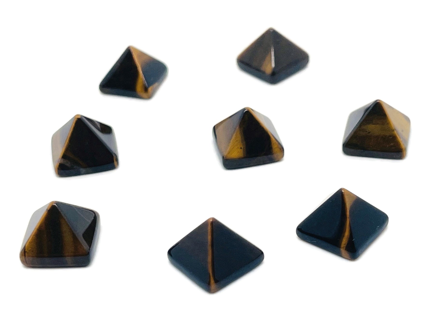 14mm Tiger Eye pyramid gemstone carving by GemstoneGO, showcasing a polished, golden-brown pyramid with detailed facets.