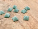 A 14mm Aventurine pyramid gemstone carving by GemstoneGO, showcasing smooth green stone with natural patterns and facets.