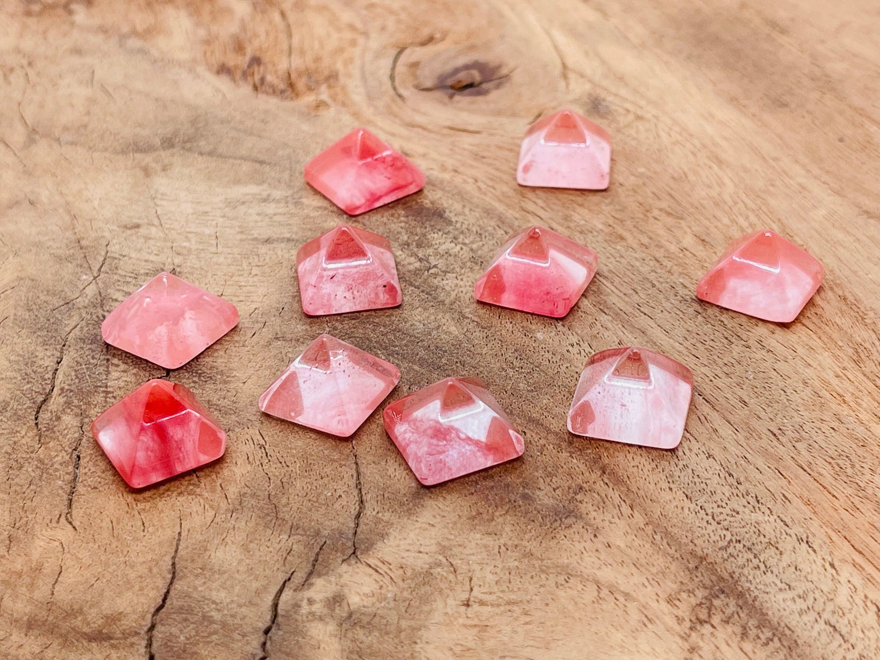 14mm Cherry Quartz pyramid gemstone carving from GemstoneGO, showcasing a vibrant red quartz pyramid with detailed craftsmanship.