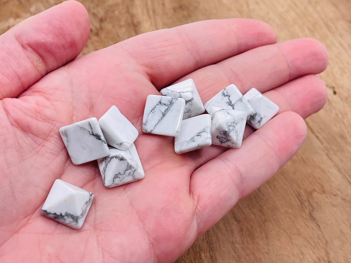 14mm Howlite pyramid gemstone carving by GemstoneGO, featuring smooth white stone with gray veining and a polished finish.