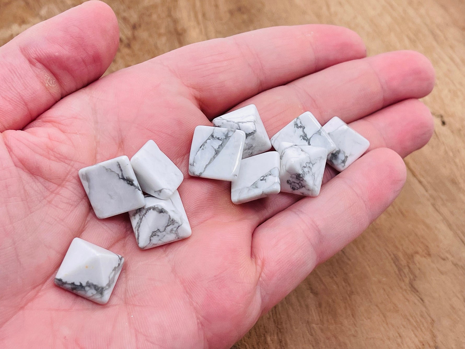14mm Howlite pyramid gemstone carving by GemstoneGO, featuring smooth white stone with gray veining and a polished finish.
