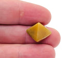 Yellow jade pyramid carving gemstone, 14mm, from GemstoneGO, showcasing a smooth, polished yellow jade pyramid with natural stone textures.