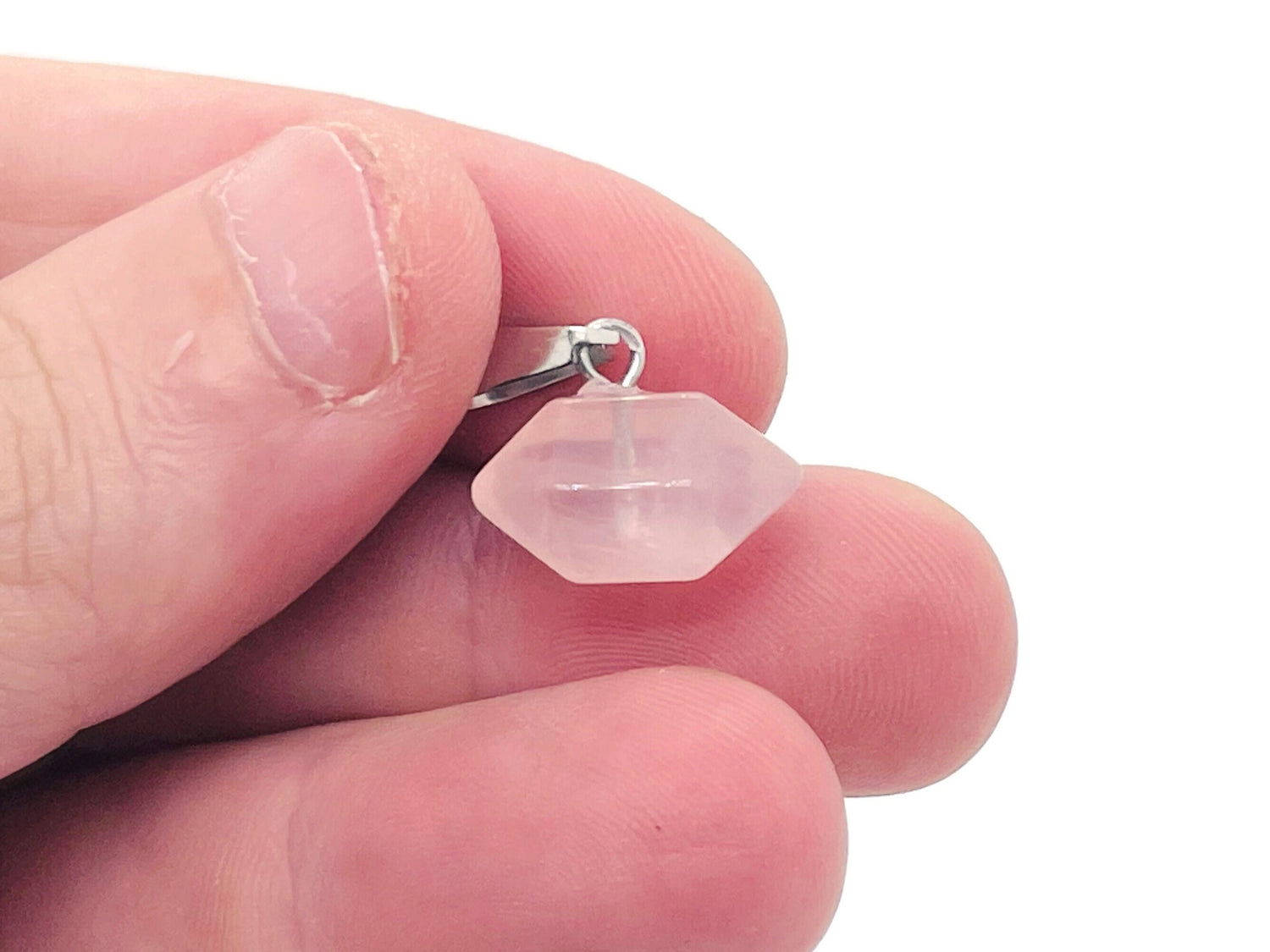 Rose quartz point crystal pendant from GemstoneGO, showcasing a pink gemstone with a pointed shape for jewelry making.