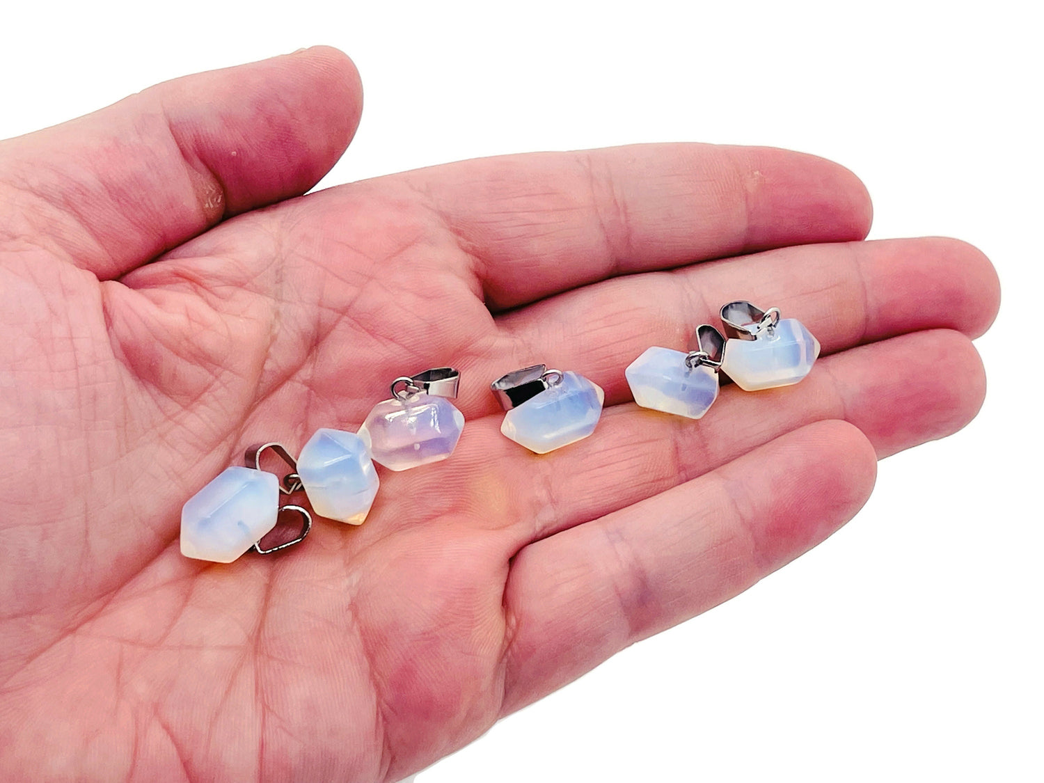 Opalite point crystal pendant from GemstoneGO, showcasing a smooth, translucent opalite gemstone for jewelry making.