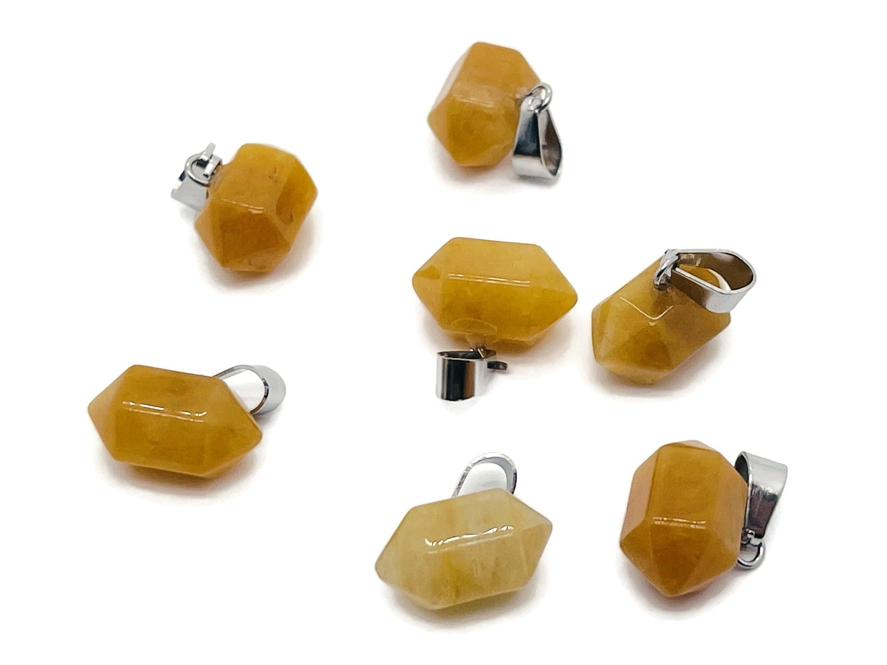 Yellow jade point crystal pendant from GemstoneGO, featuring a polished yellow jade stone ideal for jewelry making.