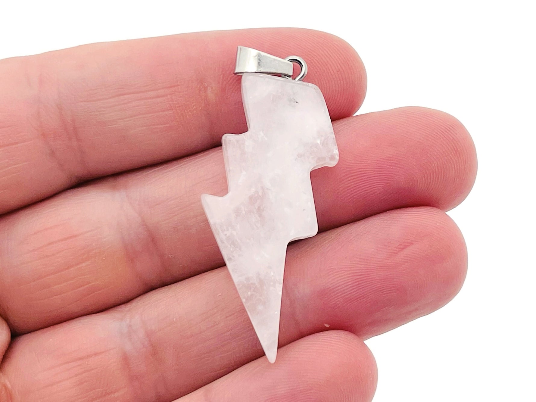 Rose Quartz Lightning Crystal pendant from GemstoneGO featuring a polished pink gemstone with silver accents.