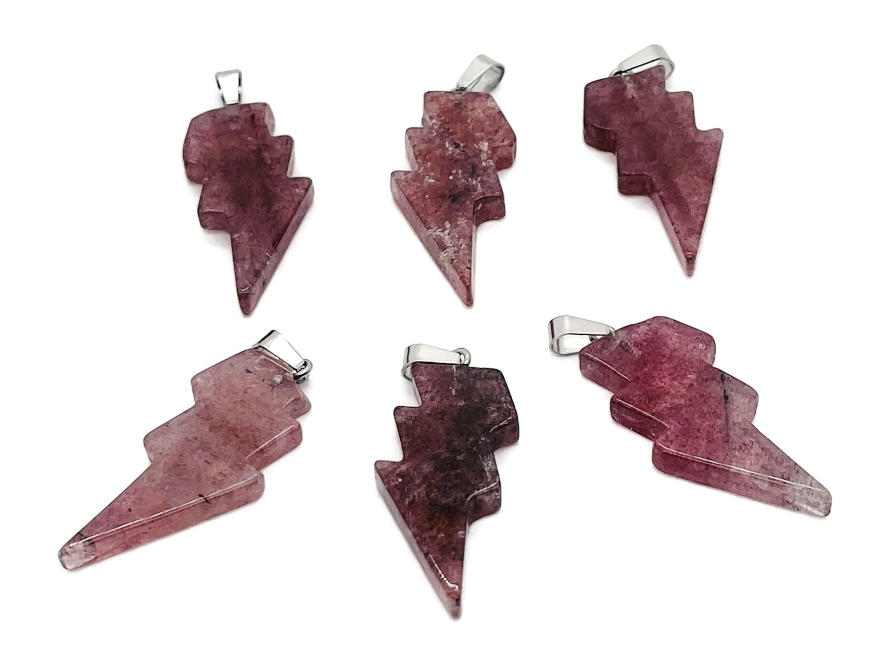 Strawberry Quartz Lightning Crystal Pendant by GemstoneGO featuring a vibrant pink quartz gemstone set in a lightning bolt design.