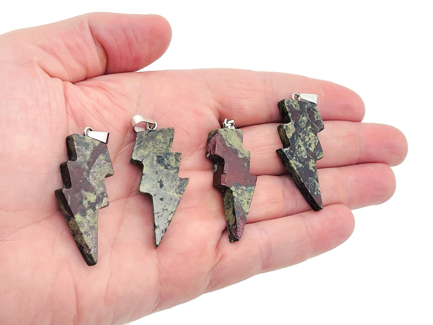 Dragon Blood Jasper lightning crystal pendant featuring vibrant red and black gemstone with lightning stone accents, from GemstoneGO.
